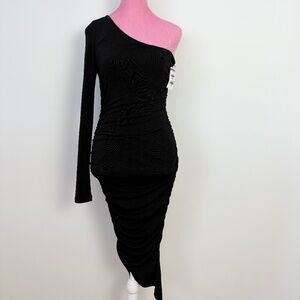 Likely sparkly one shoulder dress